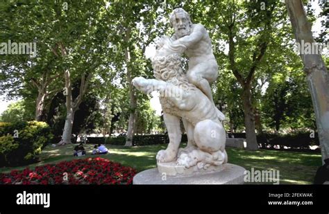 Statue of Hercules' fight with the Nemean lion in El Retiro gardens ...