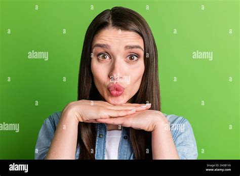 Portrait Of Attractive Funny Cheerful Girl Sending Air Kiss Amour