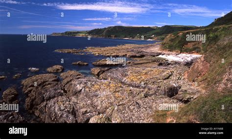 Rocky South Devon coastline at Lannacombe Bay, looking southwest towards Langerstone Point near ...