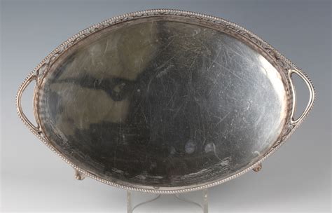 A Late Victorian Silver Oval Two Handled Tray With Pierced Scroll