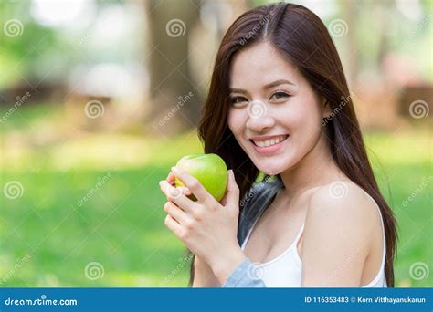 Beautiful Asian Women Model Hand Hold Green Apple Nutrition Fruit Stock