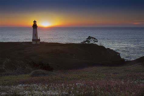 lighthouse sunset royalty  photo