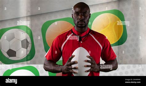 Composition Of African American Male Rugby Player Holding Ball Over