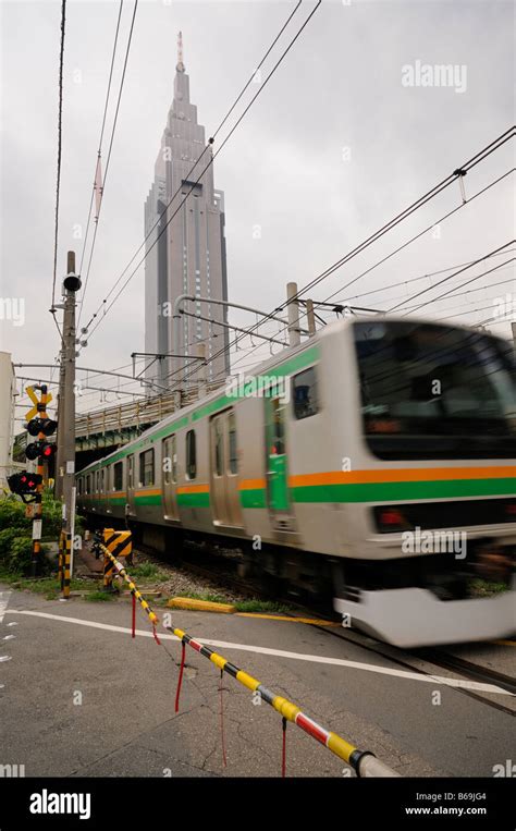 NTT DoCoMo Yoyogi Building Background And A Train In Movement On A