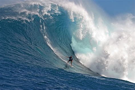 Big wave surfing in Hawaii Photograph by David Fleetham - Fine Art America