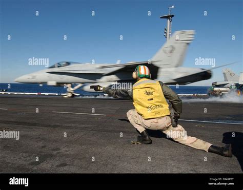 US Navy An F A 18 Hornet Launches From One Of Four Steam Powered