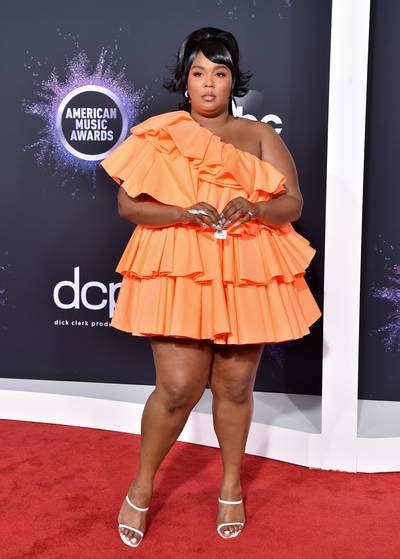 Lizzo Is On The Image 2 From Barbiecore Lizzo Perfectly Coordinates Her Bright Pink Hair