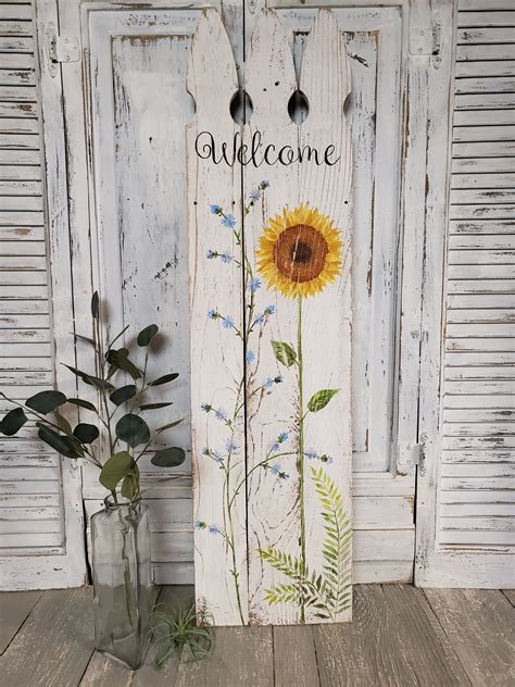 Welcome Sunflower Sign Picket Fence With Wild Flowers Painted On Pall