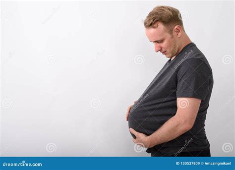 Man Holding His Stomach Like He Would Be Pregnant And Expecting Baby