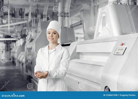 Plant Operator Engineer Flour Mill On Background Of Modern Equipment