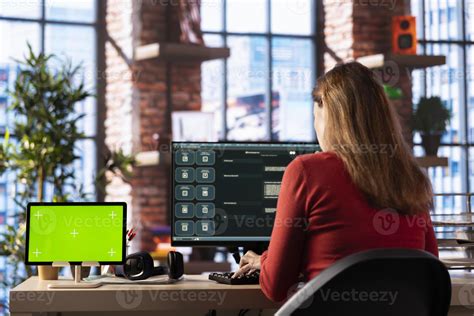 Female freelancer using AI assistant on pc for auto generated solutions