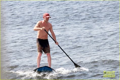 Vincent Cassel Goes Paddleboarding During Beach Day With Wife Tina