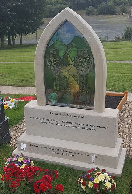 Sandstone Memorial With Stained Glass Memorials And Headstones