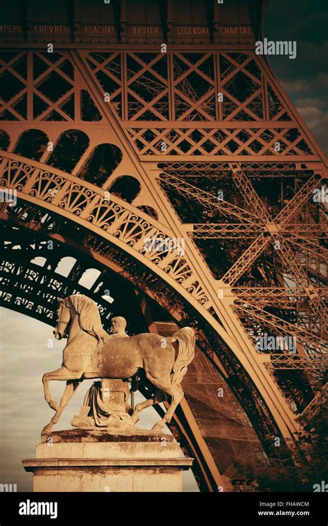 Eiffel Tower Closeup And Sculpture In Paris France Stock Photo Alamy