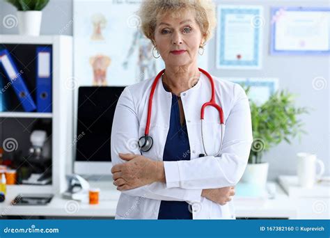Female Mature Doctor Against Medical Hospital Stock Photo Image Of Business Adult 167382160