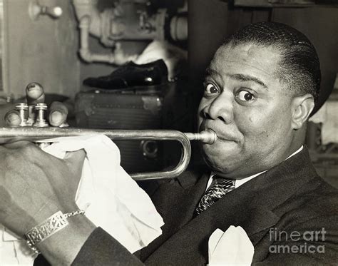 Louis Armstrong Blowing His Trumpet by Bettmann