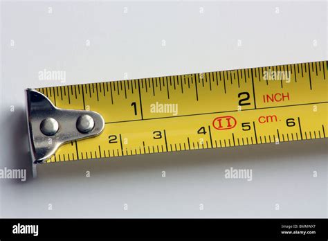 A tape measure showing a length of around 2 inches Stock Photo - Alamy