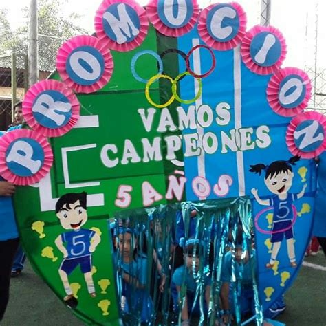 Some People Are Standing In Front Of A Sign With The Olympic Rings On