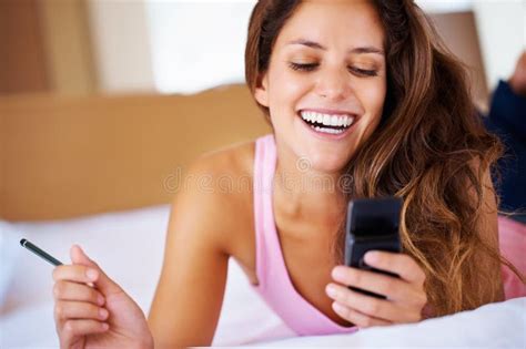 Beautiful Woman Reading Text Message Beautiful Woman Lying In Bed And