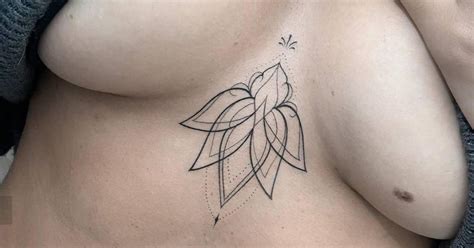 Ornamental Lotus Flower Tattoo On The Sternum