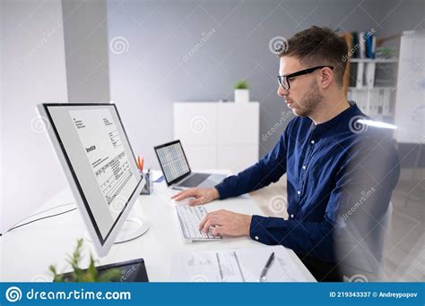 Businessman Calculating Invoice In Office Stock Image Image Of