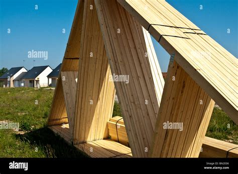 Timber Roof Trusses On New Domestic Housing Construction Building Site