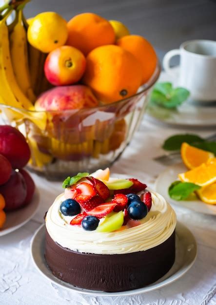 Premium Photo Photo Naked Chocolate Cake Decorated With Fruits