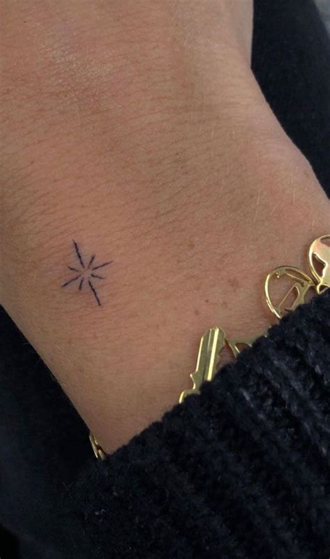 Unique Small Tattoo Designs Ideas A Starburst Wrist Tattoo