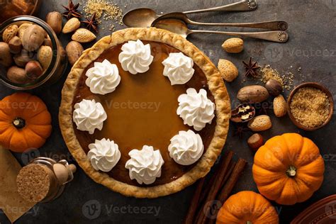 Pumpkin pie with whipped cream 15751354 Stock Photo at Vecteezy