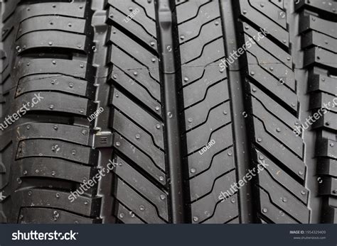 symmetrical directional tire tread pattern car stock photo