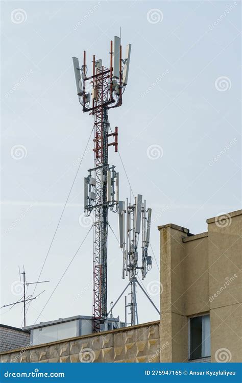 New Gsm Antennas On The Roof Of A Residential Building In The City For