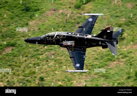 RAF Hawk T2 Jet Trainer flying low level in the mach loop area of Wales ...