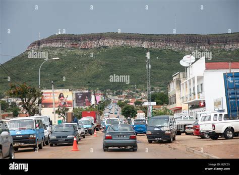 Street View Of The City Of Lubango, Angola, With Mountain, 55% OFF