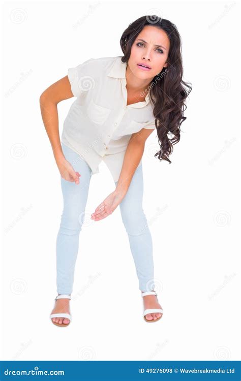 Pretty Brunette Frowning At Camera Stock Photo Image Of White
