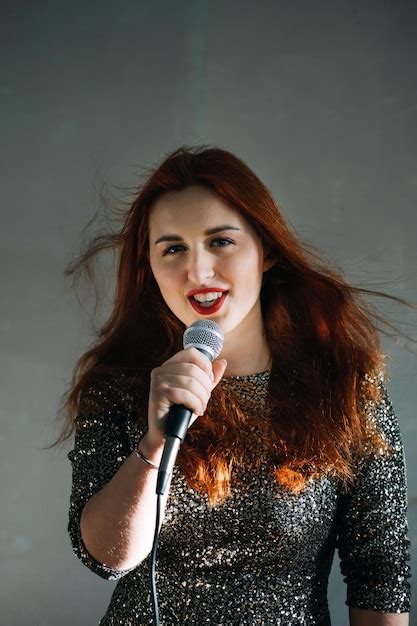 Premium Photo Portrait Of Redhead Female Singer Woman In Sparkly