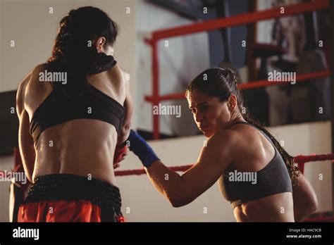 Two Female Boxers Fighting In The Ring Stock Photo Alamy