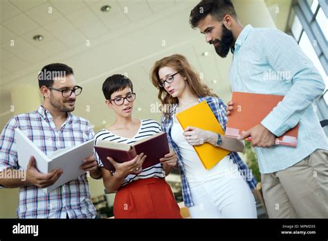 Group Of Young Students Studying Together Stock Photo Alamy