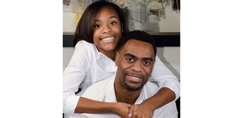 Photo Tyson Gay pose avec sa fille Trinity une photo hommage que le sprinter a partagé sur sa