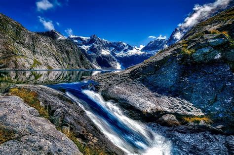 HD wallpaper: landscape photography of waterfalls, fiordland national ...