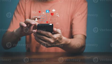 Man using smartphone with social media icons, love, search, people