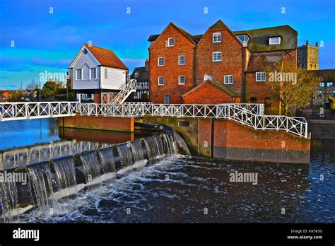 This Pretty Riverside View Of Tewkesbury Water Mill And Weir On River