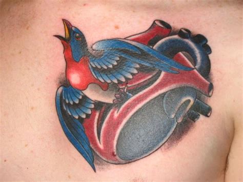 Thomas Graham Super Genius Tattoo Seattle Wa Color Tattoo Robin Heart