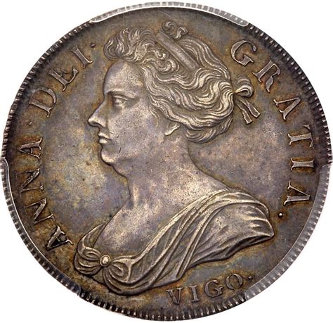 An Old Silver Coin With A Woman S Face On The Front And Side Of It