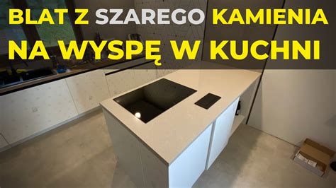 Blat z szarego kamienia na wyspę w kuchni Kamieniarstwo ABC