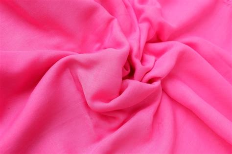 Premium Photo | Pink fabric texture close-up wallpaper