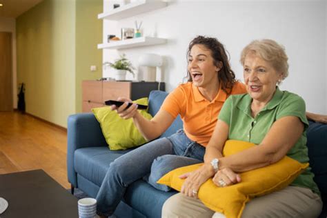 20 Grandma Watching Tv Alone Stock Photos Pictures And Royalty Free