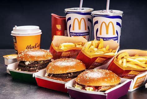 Various Burgers With French Fries Cola And Sauces From Mcdonald S