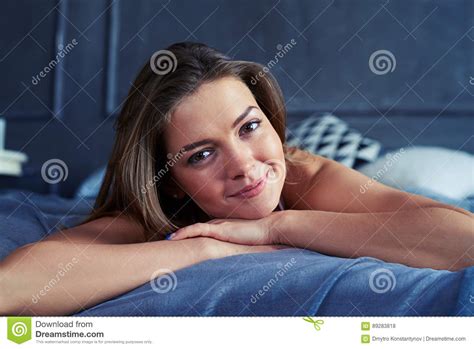 Close Up Shot Of A Pretty Brunette Lying On The Bed Stock Photo Image Of Indoors Glamour