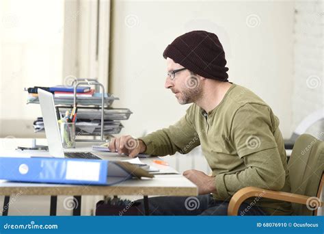 Happy Attractive Hipster Businessman Working With Computer Laptop At