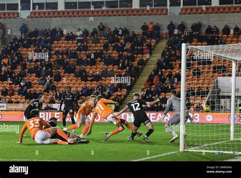 Marvin Ekpiteta Of Blackpool Scores To Make It During The Bristol